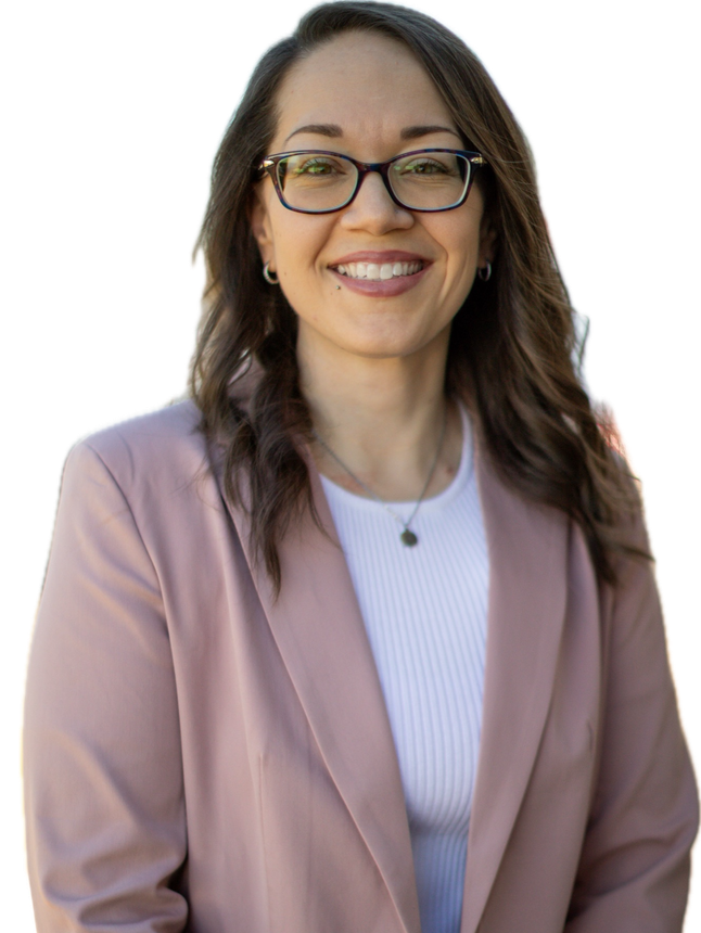 Samantha, a woman in glasses and a dusty pink blazer, smiling.
