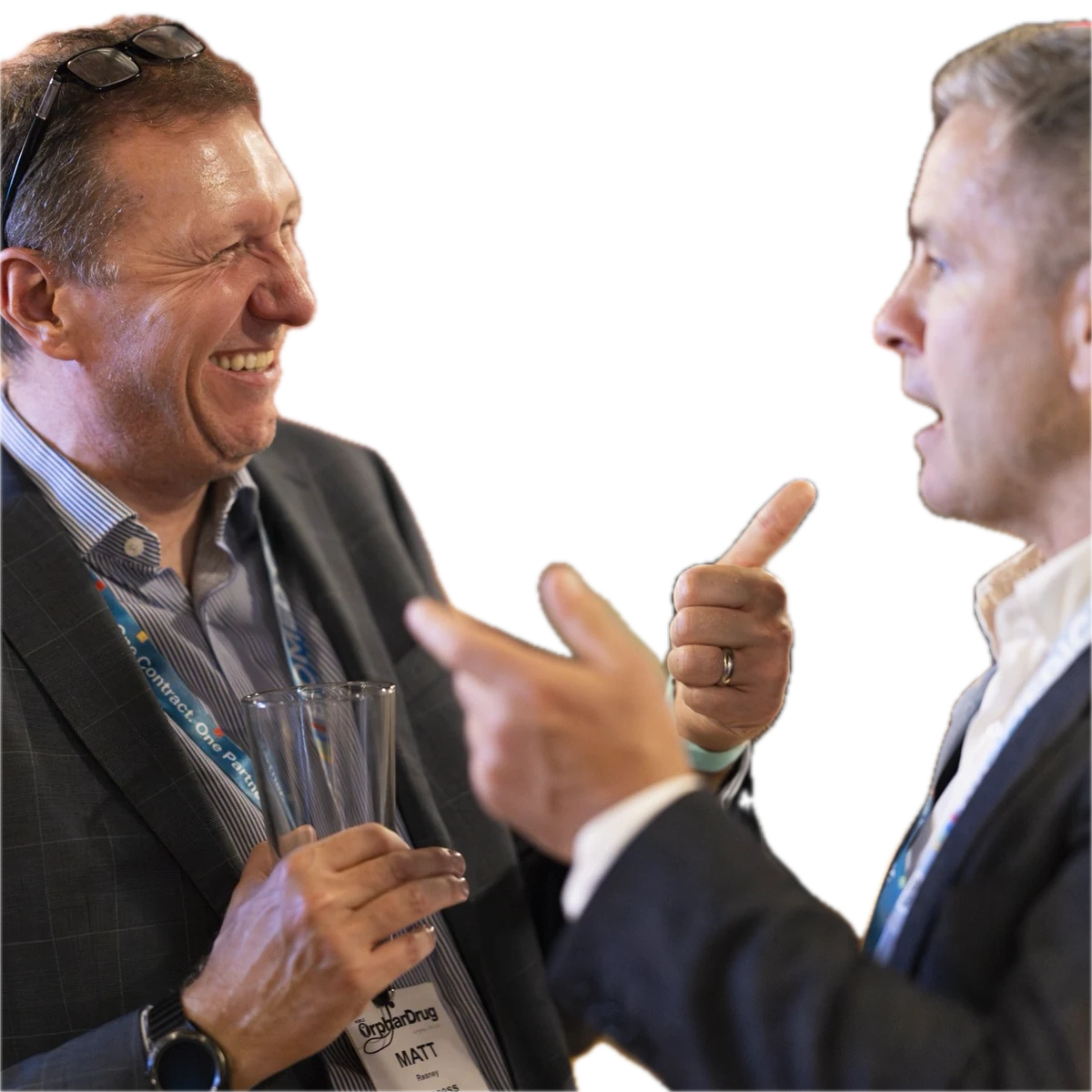 Two men in conversation at an industry event